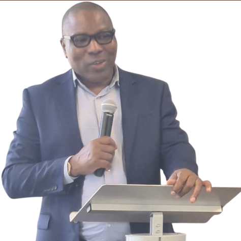 Church leader speaking at a lectern